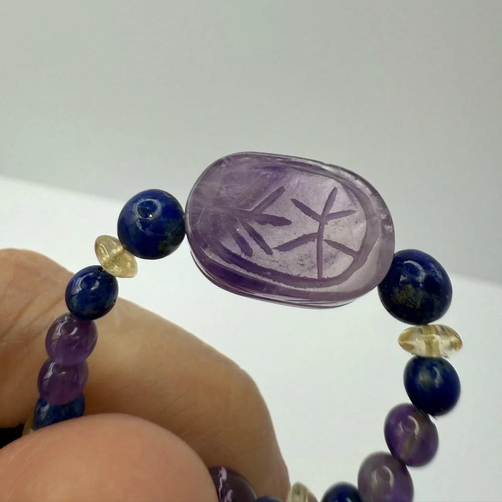 Carved amethyst lizard pendant with amethyst rock crystal necklace
